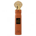 Al-Ahlia Air Freshener in a dark chocolate brown bottle with a gold cap and ornate gold top detail, on a white background.